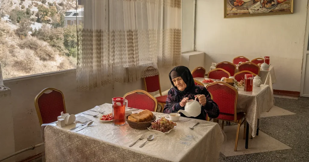 A Woman Eats in the Canteen of the Soviet-era Sanatorium